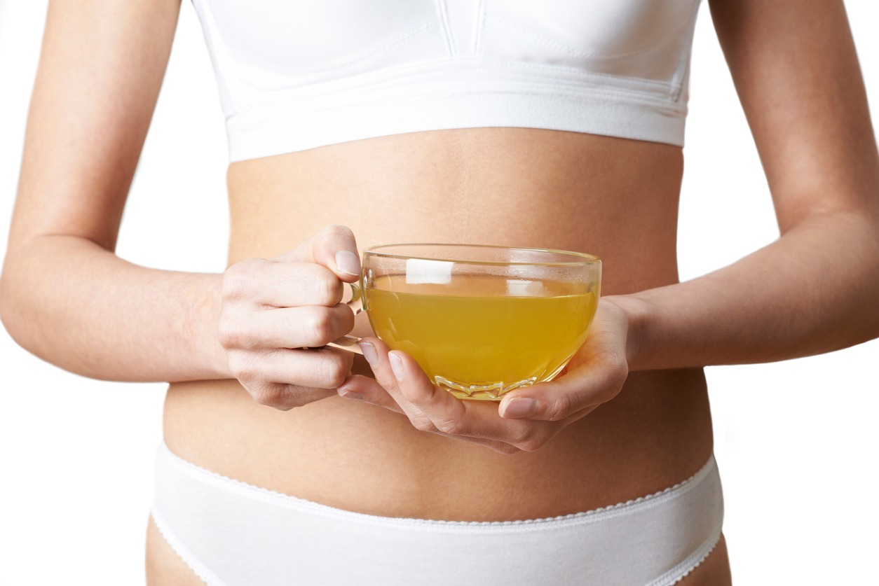 Close Up Of Woman Wearing Underwear Drinking Green Tea