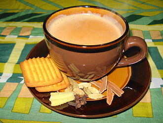 Masala Chai served with biscuits