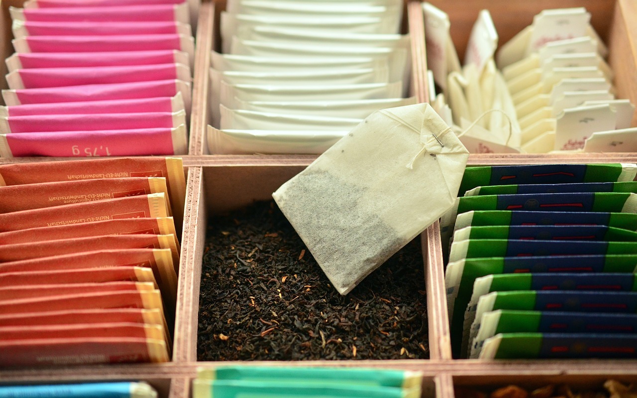 tea box containing loose tea leaves and teabags