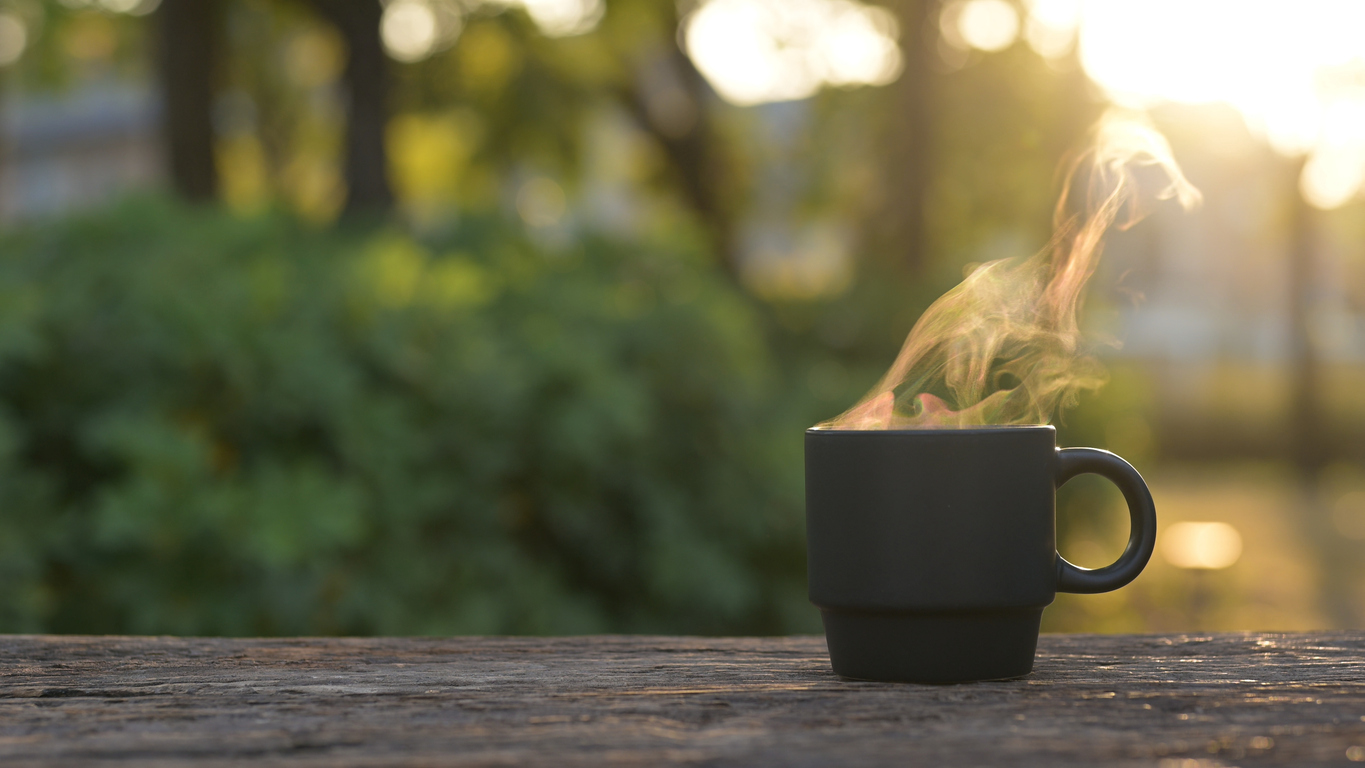a cup of hot tea outdoors