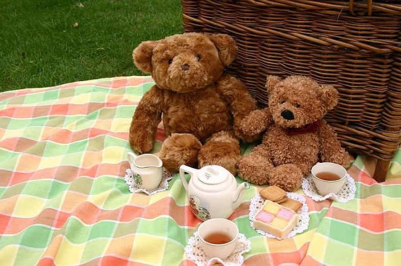 A tea party spread with teddy bears