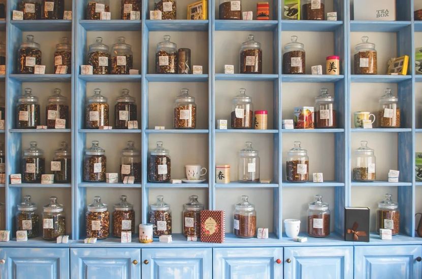 Jars filled with teas and herbs on a shelf